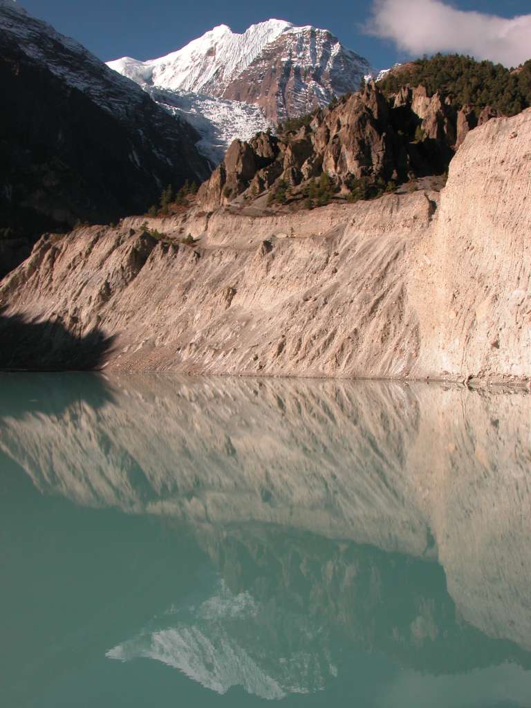 Annapurna 13 05 Gangapurna and Lake From Manang Gangapurna and the Gangapurna Glacier are reflected in the glacial lake that drops from the northern slopes of Gangapurna.